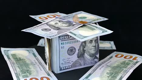 The-rotating-stand-is-also-new-and-old-100-usa-dollars,