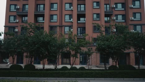 Establishing-shot-of-modern-apartment-building.-Multistoried-modern-architecture-and-stylish-living-block-of-flats