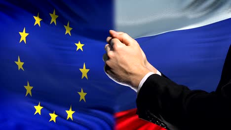 European-Union-sanctions-Russia,-chained-arms,-political-or-economic-conflict