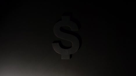 Moving-light-illuminates-US-dollar-symbol