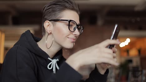 Young-Girl-Using-Smartphone