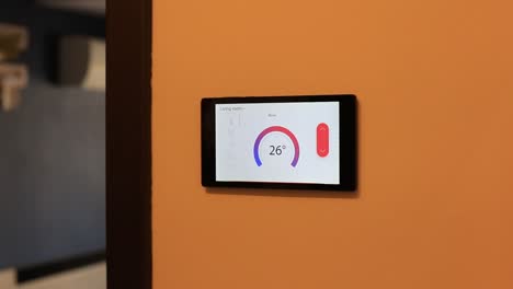 Smart-home-climate-control-device-on-a-wall