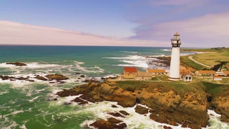 Light-House-Drone-Shot-Aerial-Helicopter-View-Ocean-Coast-Line-with-crashing-waves-sun-set-4K