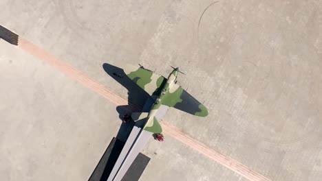 aerial-view-of-monument-of-old-russian-attack-aircraft-Il-2-in-summer-day