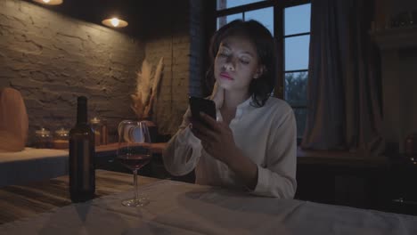 Young-Woman-Drinking-Wine-in-the-Evening