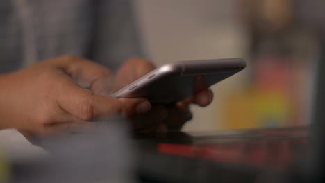 Close-up-woman-hands-texting-message-on-mobile-smart-phone-for-communication.