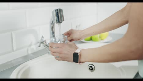 Woman-Pouring-Water-in-Glass