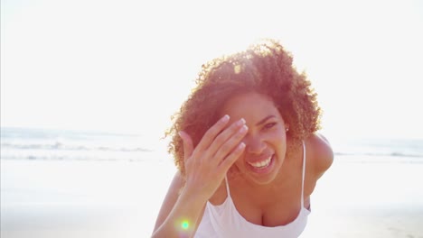 Portrait-of-graceful-African-American-female-on-beach