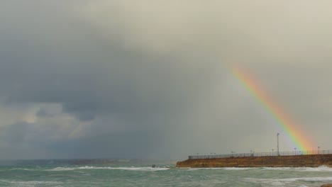 Rainbow-over-the-quay.-The-cloud-closes-the-rainbow