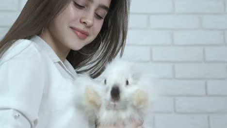 Beautiful-girl-with-a-white-rabbit.