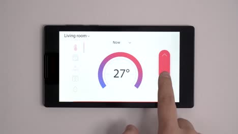 Smart-home-climate-control-device-on-a-wall