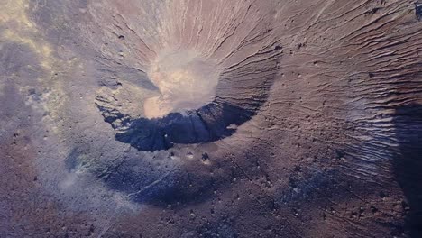 Aerial-view-with-a-drone-of-a-crater-of-the-moon,-or-a-planet-in-the-solar-system.