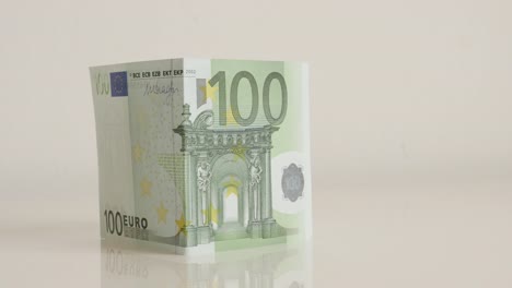 Building-house-concept-with-Euro-banknotes-close-up-4K