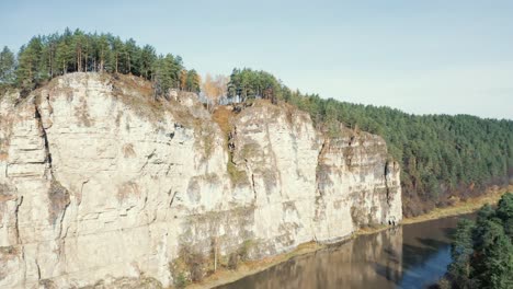 Aerial-view;-camera-making-panorama-of-landscape-with-cliffs-forest