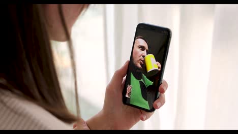 Woman-talking-to-a-man-on-a-video-call-smartphone