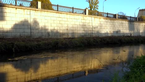 panoramic-view-of-the-embankment-of-the-city-river-and-cast-iron-fence