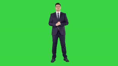 Businessman-Listening-on-a-Green-Screen,-Chroma-Key