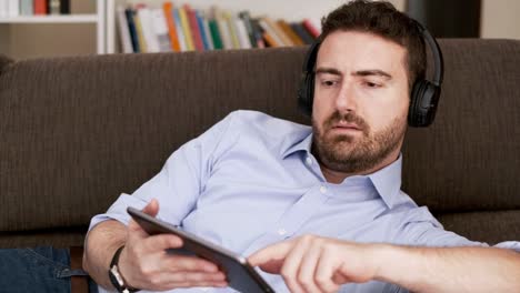 Video-about-man-listening-to-music-at-home