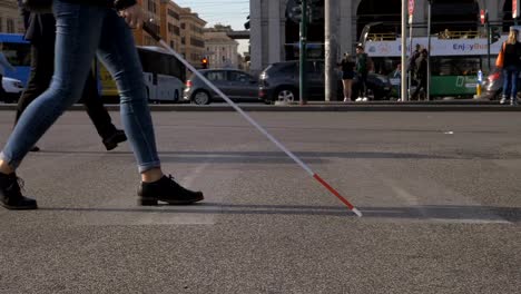 close-up-on-blind-independent-person-crosses-the-street-with-his-cane.-Blindness,-autonomy