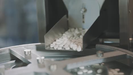 Production-of-tablets-close-up.-Pharmacological-factory.-Conveyor-line-for-the-production-of-tablets