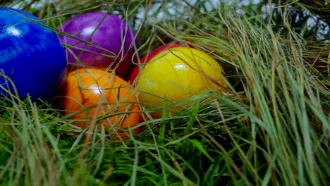 Sliding-over-a-nest-with-Easter-Eggs---close-up-shot