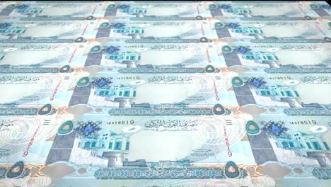 Banknotes-of-five-bahraini-dinars-of-Bahrain-rolling,-cash-money