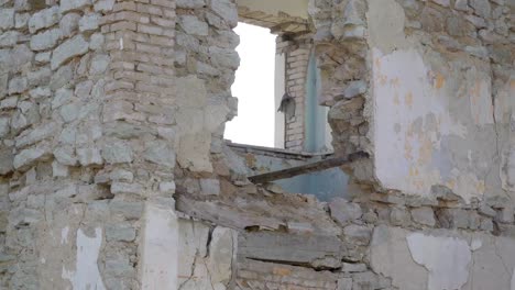 Damaged-brick-walls-of-the-house-from-the-war