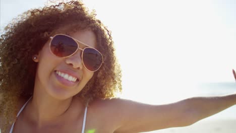 Portrait-of-African-American-female-relaxing-in-sundress