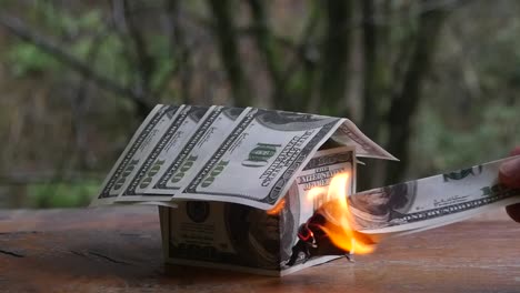 Burning-house-of-dollars-bills