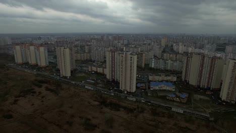 Aerial-drone-footage-of-gray-urban-city-outskirts-with-identical-houses