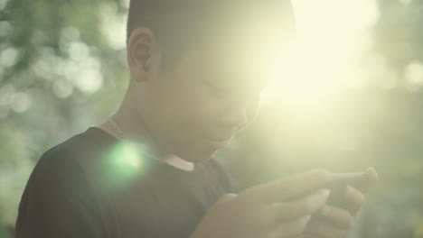 Boy-using-smartphone