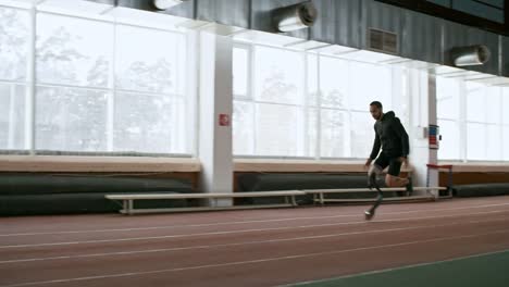 Adaptive-Sportsman-with-Artificial-Leg-Running-on-Track