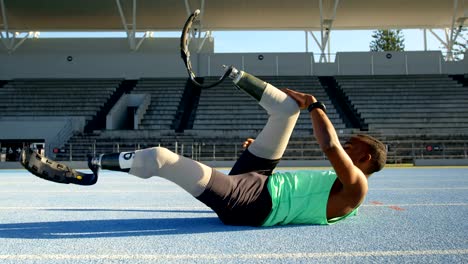 Disabled-athletic-exercising-on-a-running-track-4k