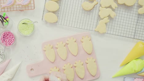 Decorating-Easter-sugar-cookies-with-royal-icing.