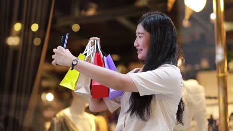 Asian-woman-using-mobile-phone