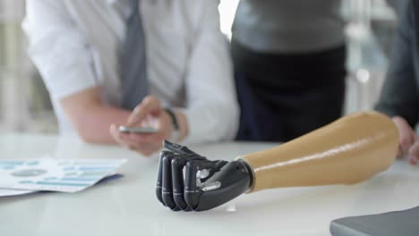 Smartphone-Controlled-Bionic-Hand-Moving-Fingers-on-Office-Table