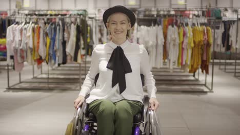 Portrait-of-Woman-in-Wheelchair-Posing-in-Clothing-Store