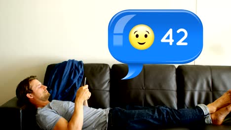 Man-lying-on-a-couch-while-texting-4k