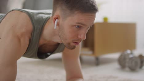 Man-Doing-Elbow-Plank-Exercise