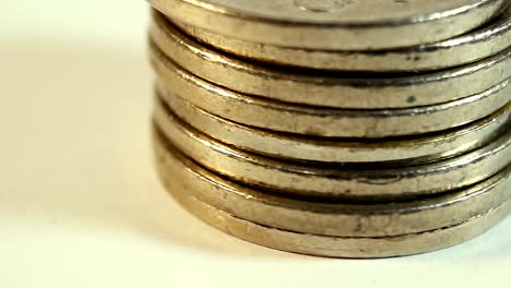 Rotated-coins-on-white-background