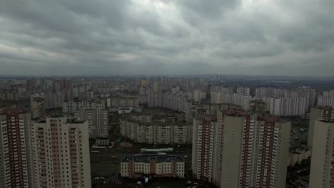 Aerial-drone-footage-of-gray-dystopian-urban-area-with-identical-houses