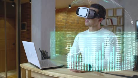 Mann-untersucht-Finanzcharts-mit-vr-Set,-futuristische-Technologie,-Hologramm,-AR