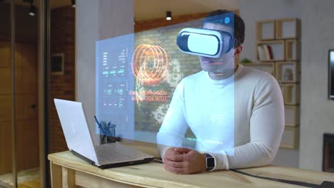 Junger-Mann-arbeitet-mit-Finanzkarten-Hologrammen,-futuristischem-Job,-Technologien