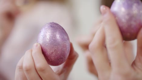 Hands-Holding-Easter-Eggs-Decorated-with-Glitter-Paint