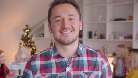 Close-up-portrait-of-a-young-man-new-year-christmas-family-evening