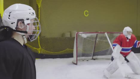 Female-Hockey-Player-Scoring-Goal