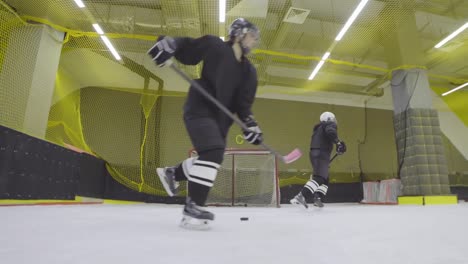 Female-Hockey-Forwards-Practicing