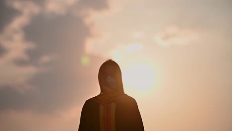 Abstract-Close-up-Rear-view-of-the-university-graduates-at-Silhouette-sunset