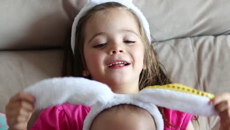 Little-girl-and-baby-brother-wearing-easter-holiday-bunny-ears