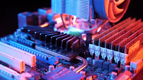 closeup-of-a-rotating-processor-CPU-fan-installed-on-the-motherboard-on-a-black-background